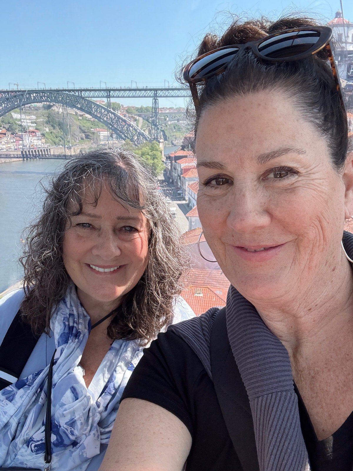 Jacque and her sister on the bridge in Porto